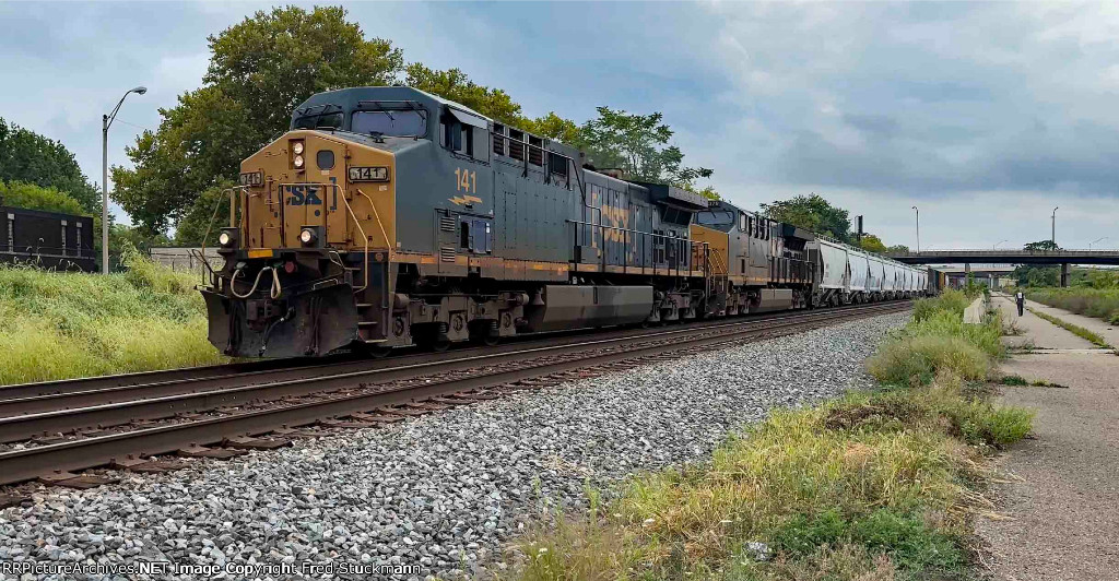 CSX 141 leads M224 on 2 track.